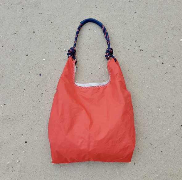 red with blue handbag seashopper